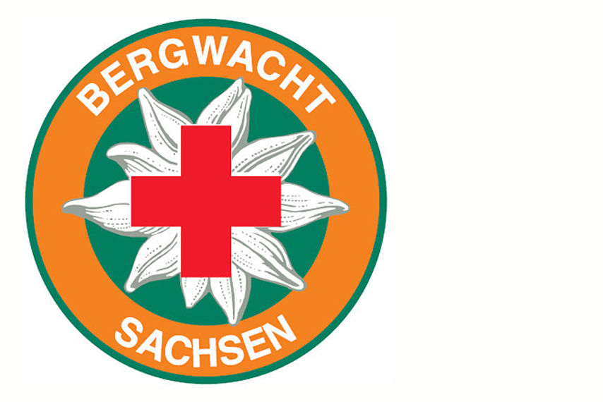 Logo mit Schriftzug Bergwacht Sachsen und Rotem Kreuz auf Edelweiß-Blüte