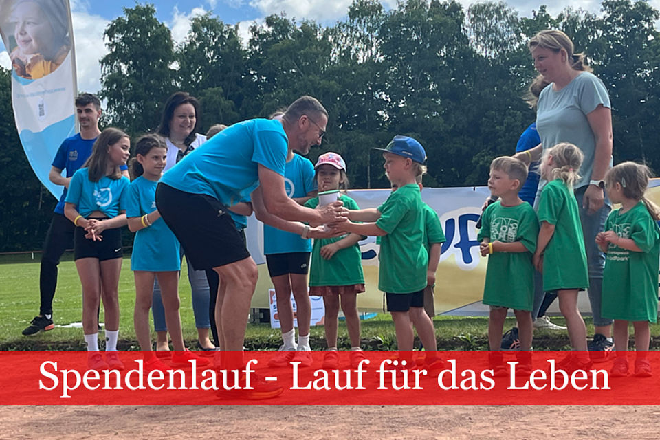 Spendenlauf - Übergabe der Spendengelder
