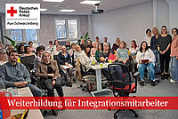 Gruppenbild der Integrationshelfer im Beratungsraum
